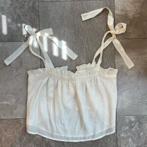 Ivory tank with bow details